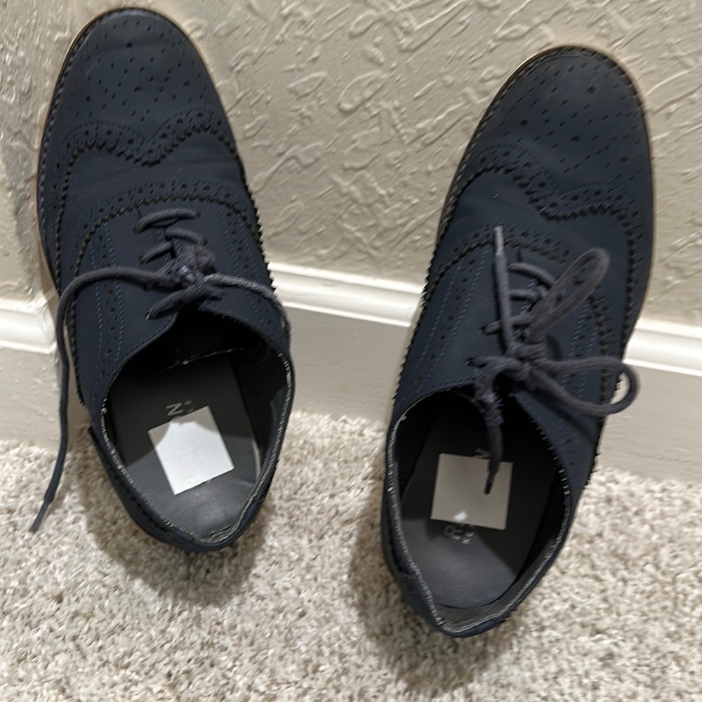 Youth dark blue, patterned, dress shoes.